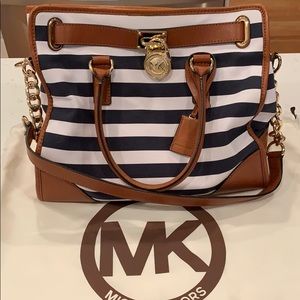Michael Kords Hamilton navy and white stripe bag